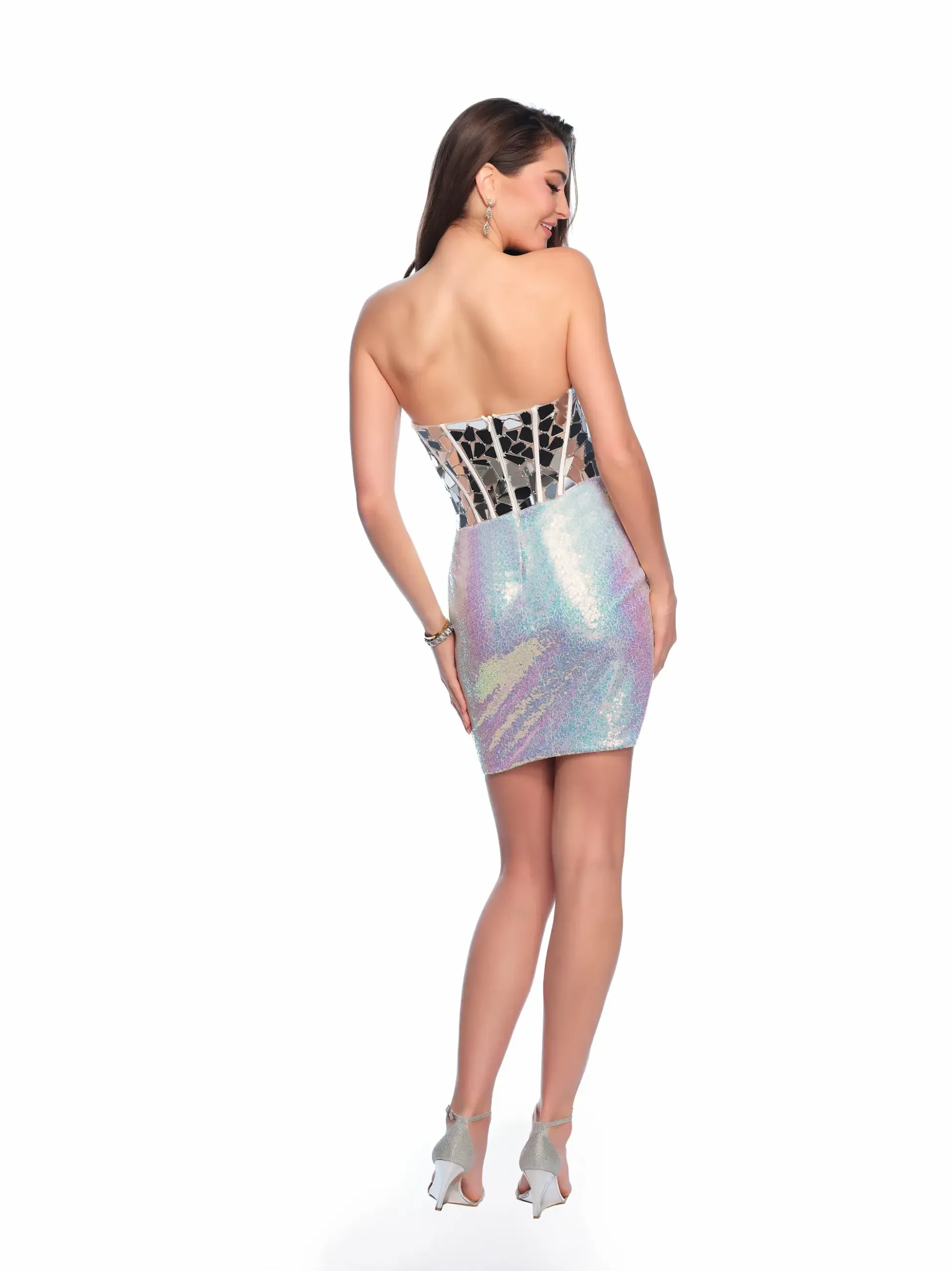 model is wearing a strapless silver mini homecoming dress