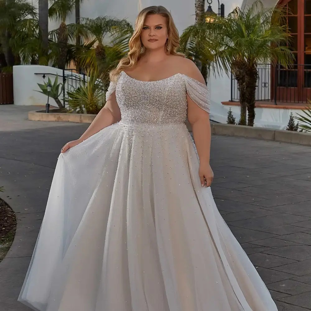 Model wearing a white gown by Julietta 