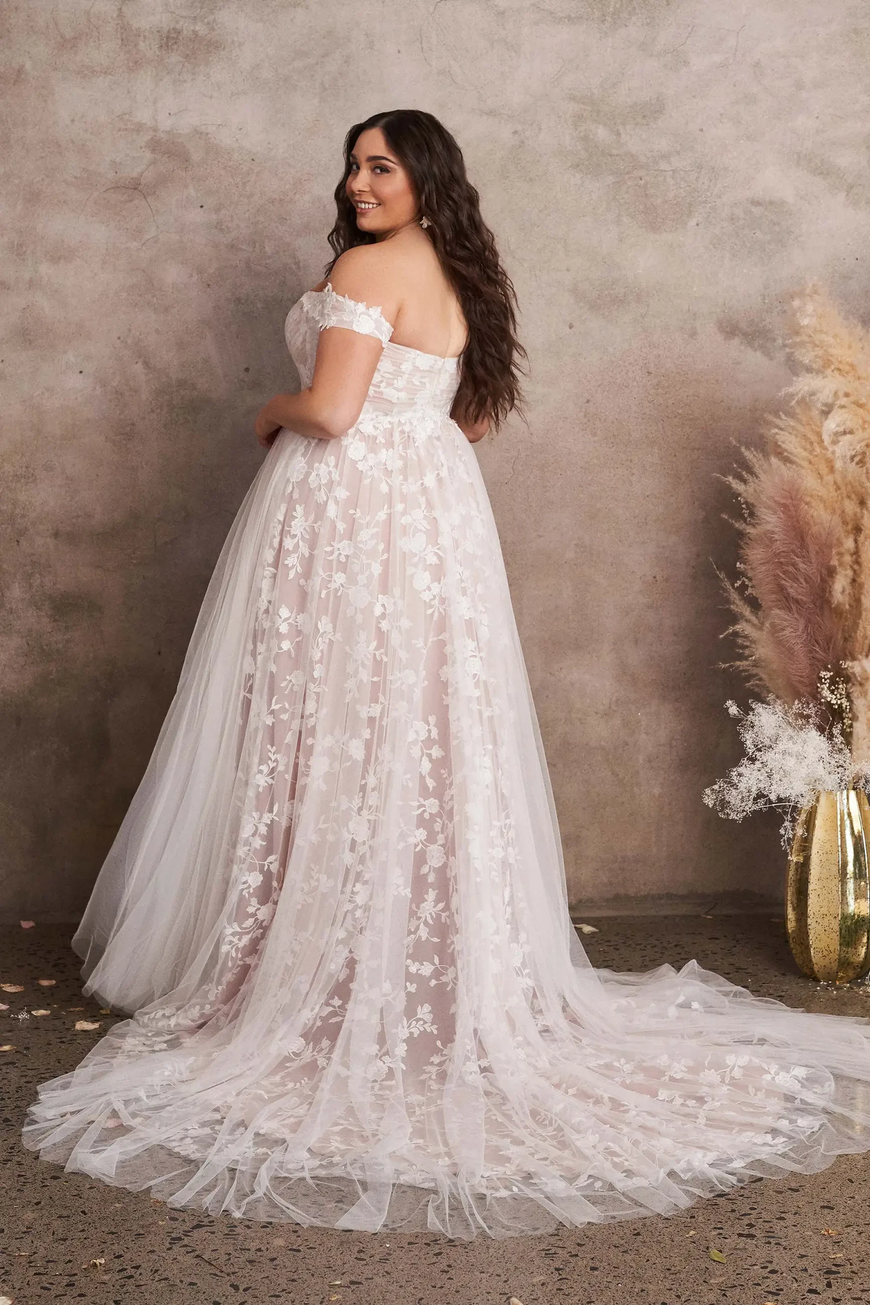 Plus-Size Bridal Perfection: Finding Your Silhouette in Our Women’s Sizing Collection Image